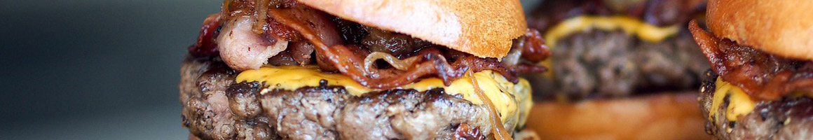 Eating Burger at Heavenly Burgers restaurant in Highland Springs, VA.